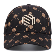 Trendy Black and White Peaked Hat with Golden Accents – Adjustable & Breathable